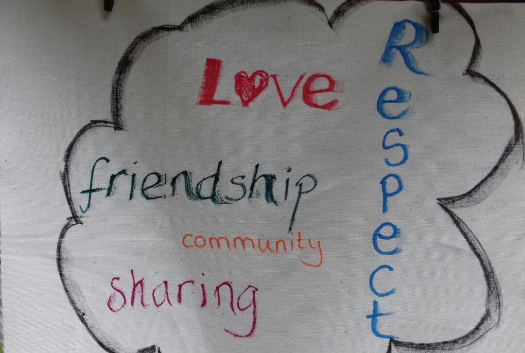 Bunting with handwritten words - Love, friendship, community, sharing, respect
